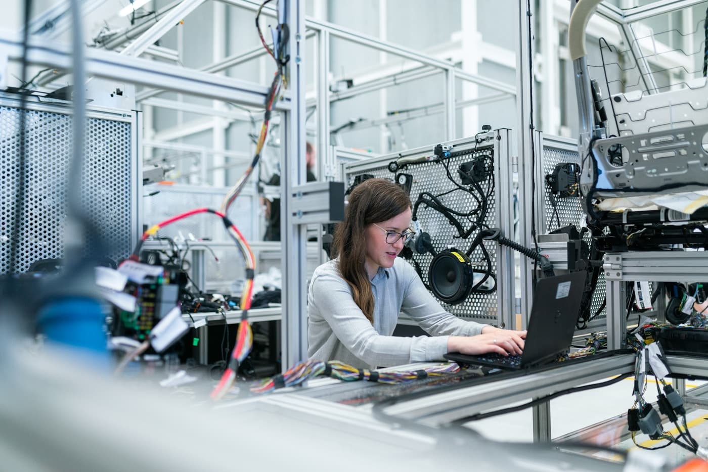 Engineer at a precision manufacturing workbench at Sanaka